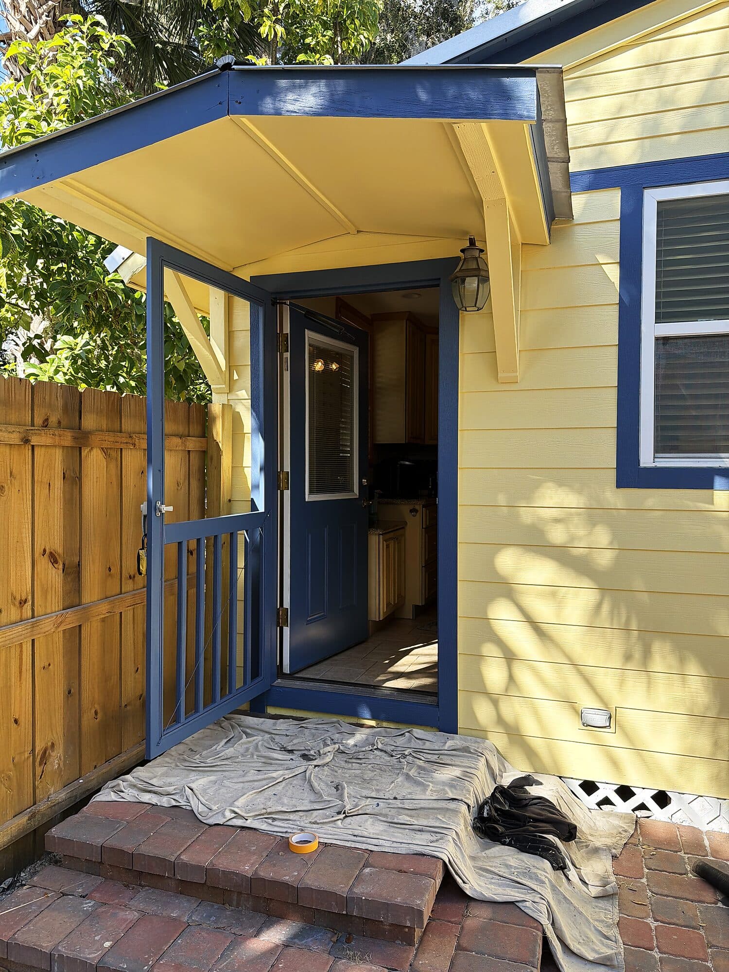 Completed exterior renovation with brick paver walkways at a home in downtown St. Augustine, Florida